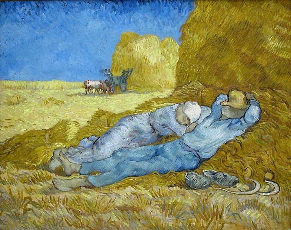 Two workers sleep beside golden haystacks, their tools resting nearby.